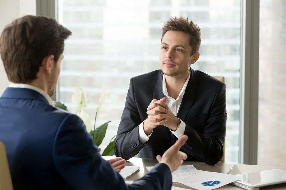 Professional man secretly hates his job