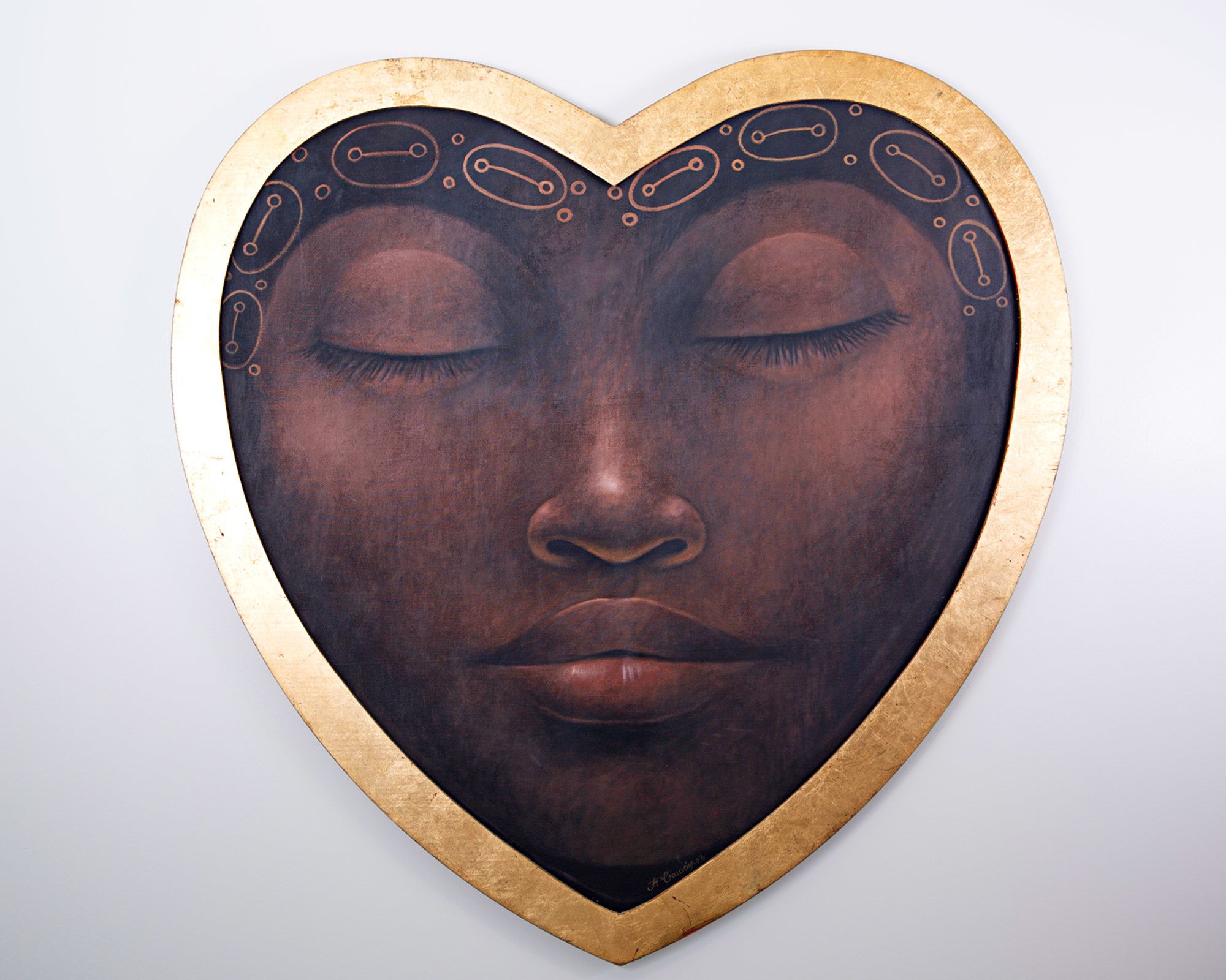 Painting of heart-shaped quasi-mask showing a woman in serene slumber.