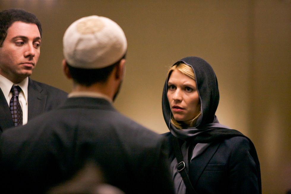 Claire Danes in a head scarf in the Middle East.
