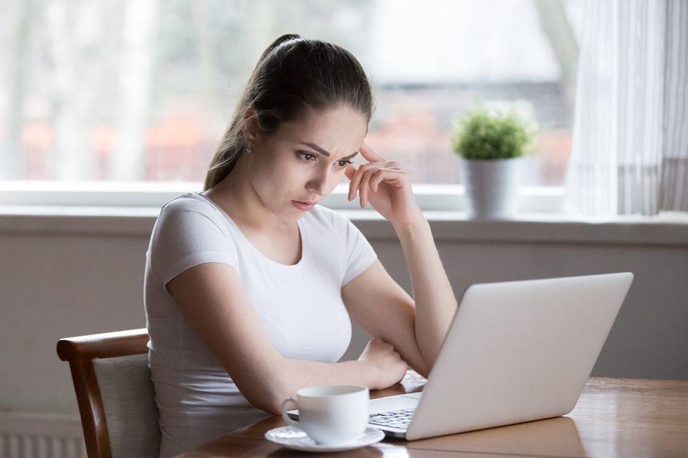 Young woman is a victim of cyberbullying