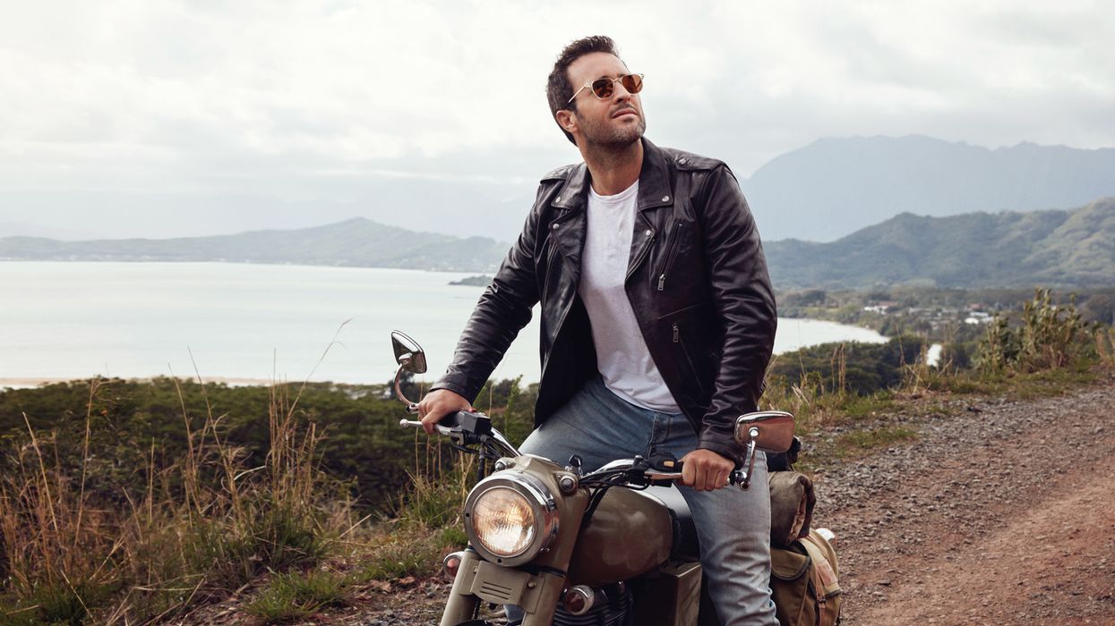 Alex O'Loughlin on a motorcycle.