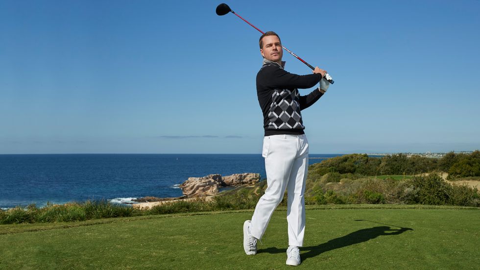 Chris O'Donnell golfing.