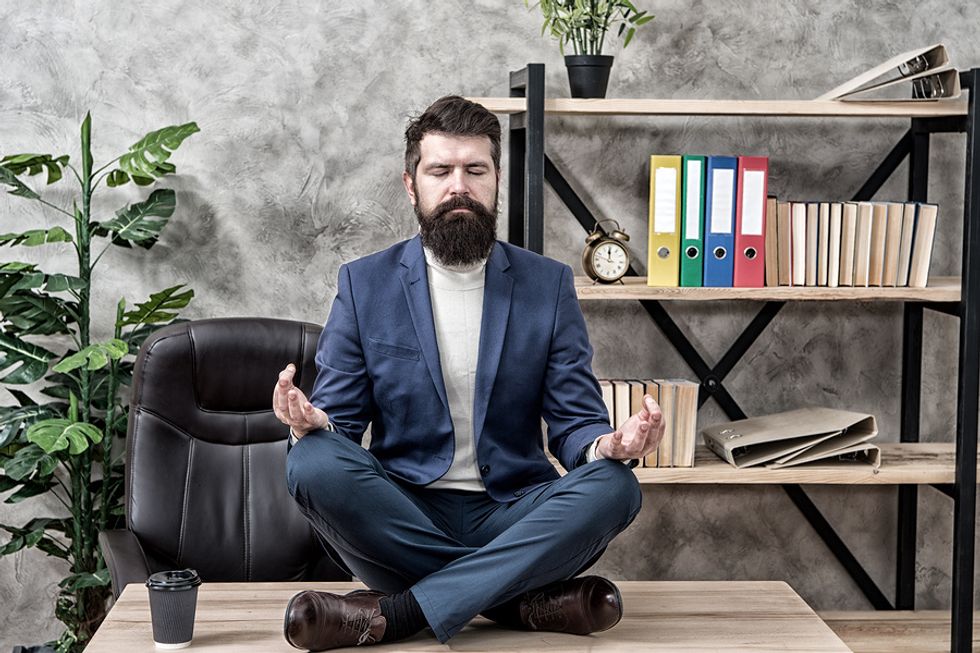 Professional man unplugging to prevent burnout