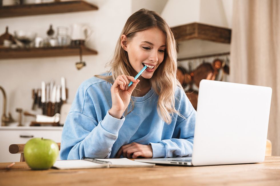 Woman writes down her career goals
