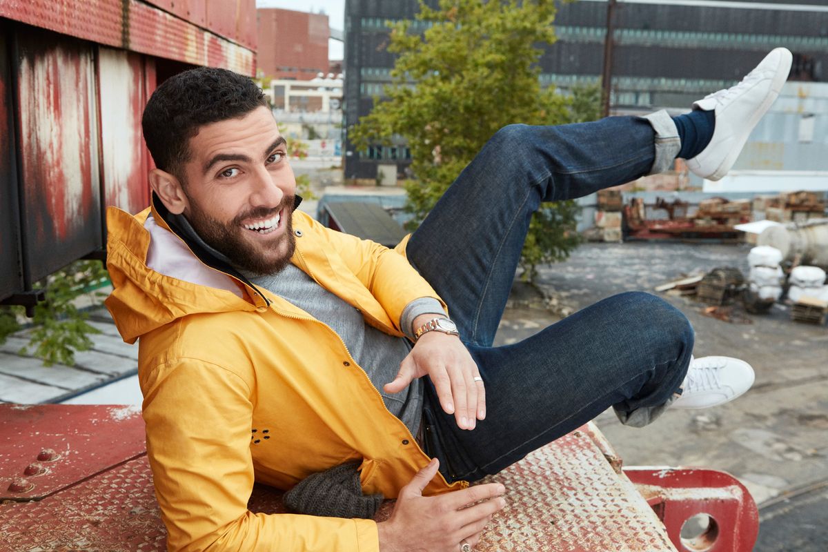 Zeeko Zaki in a yellow rain slicker.