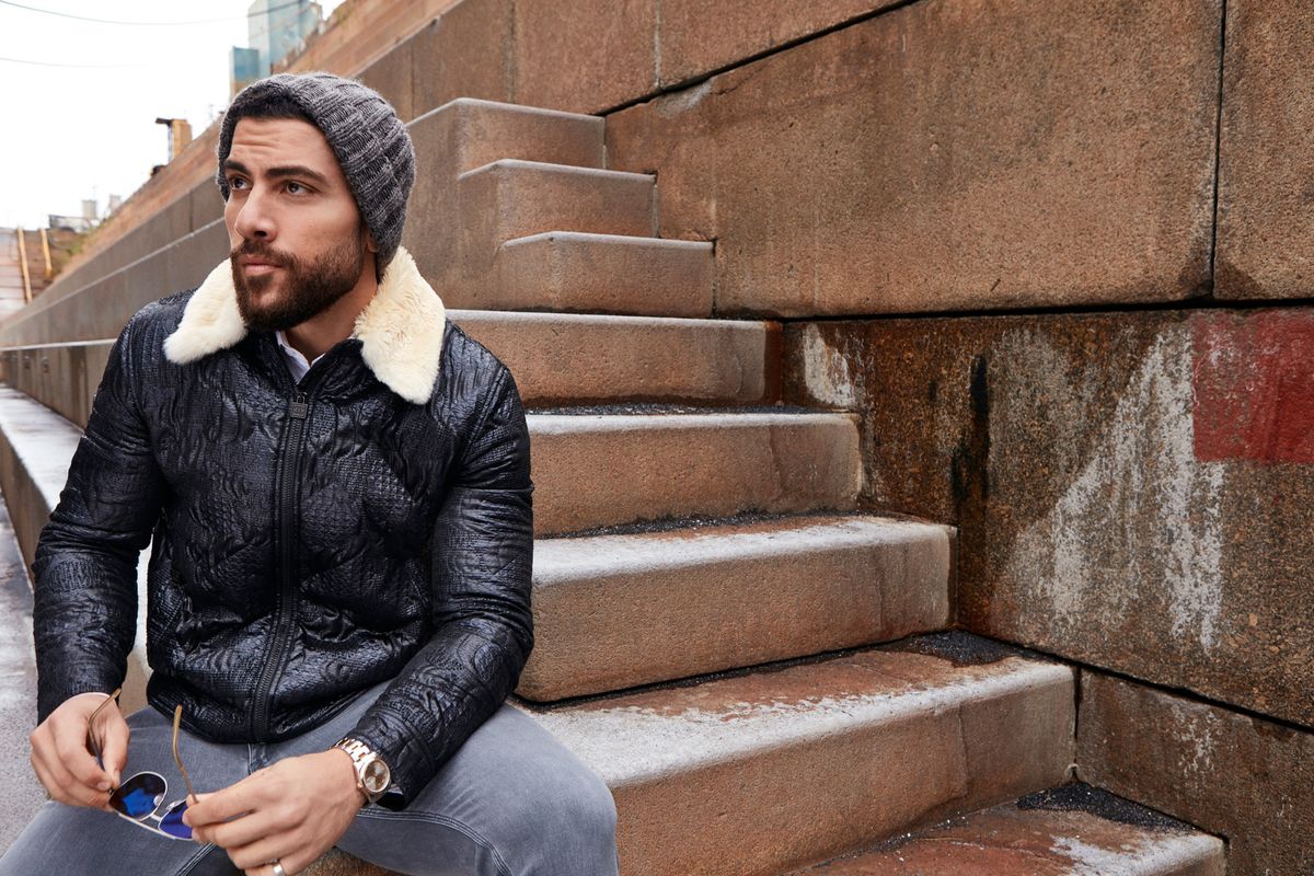 Zeeko Zaki wearing a winter jacket and beanie.