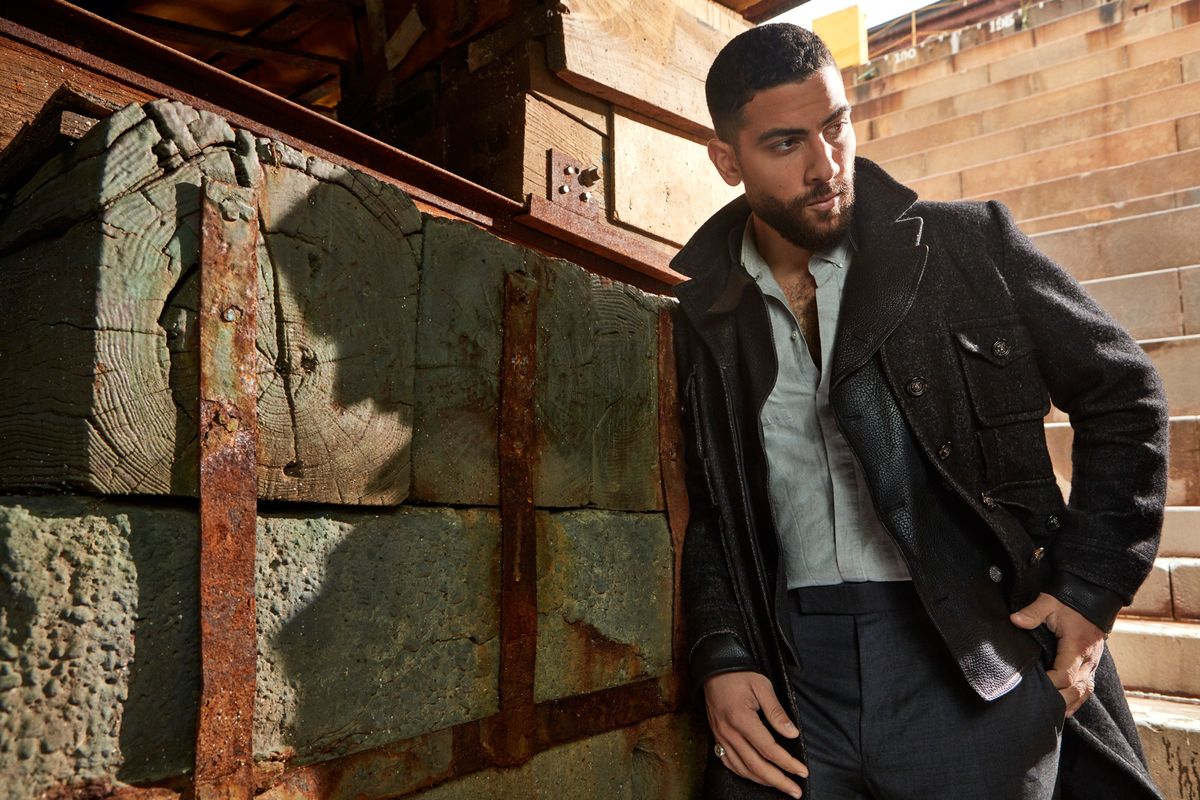 Zeeko Zaki in a designer coat.