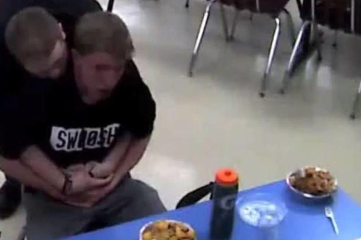 Dramatic footage shows a high-schooler saving his choking friend's life using the Heimlich maneuver