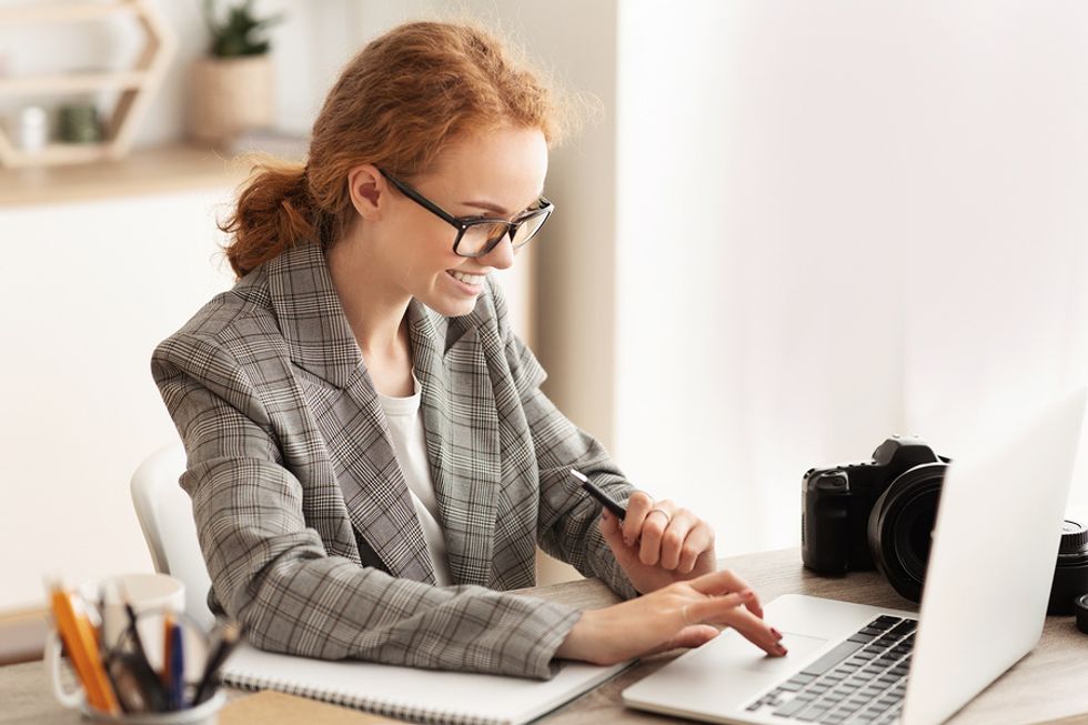 Professional woman demonstrates outcomes and accomplishments on her resume