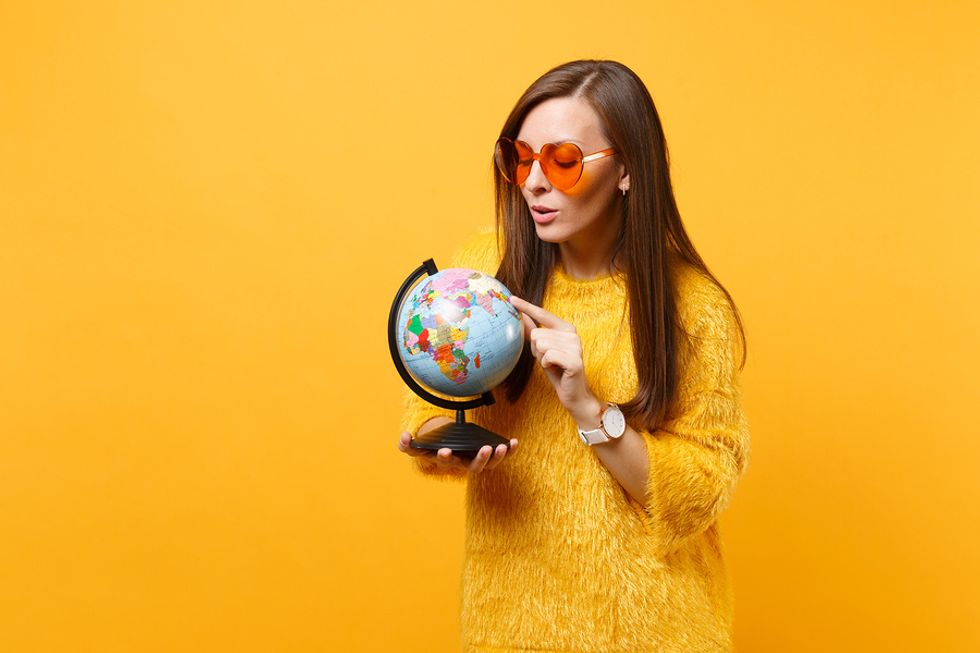 Woman picking one location for her long-distance job search