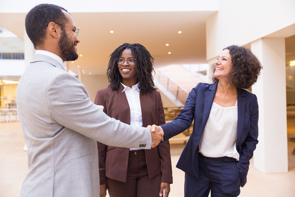 Man meets with connections at his dream company during a long-distance job search