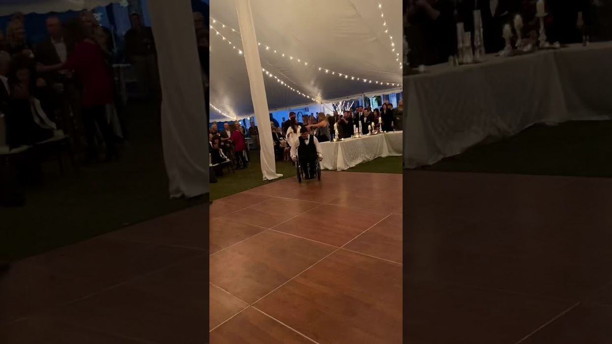Watch paralyzed Georgia man stand for emotional first dance at his wedding