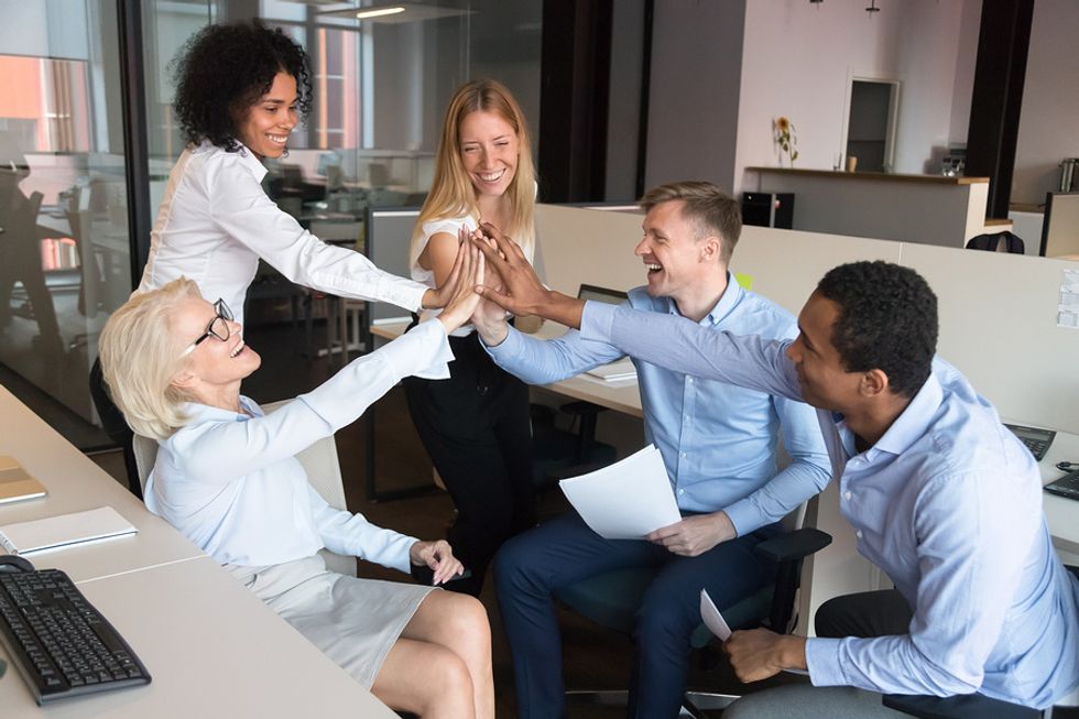 Employees working for a company with great workplace culture