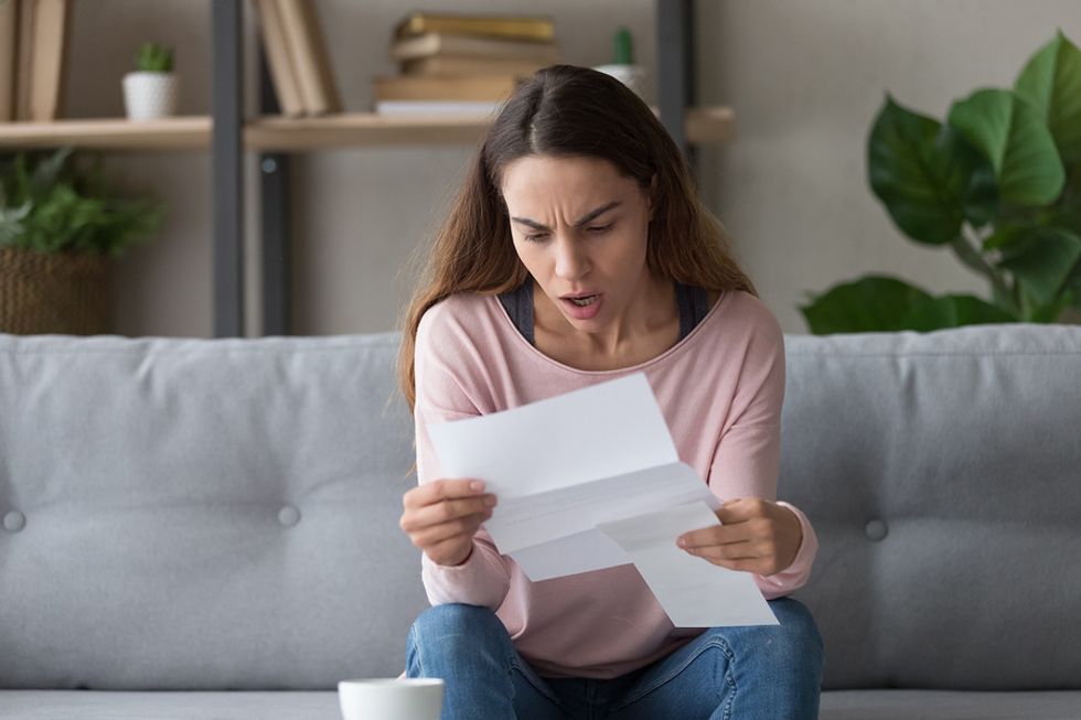 Recent college graduate gets her first loan repayment bill for student loans