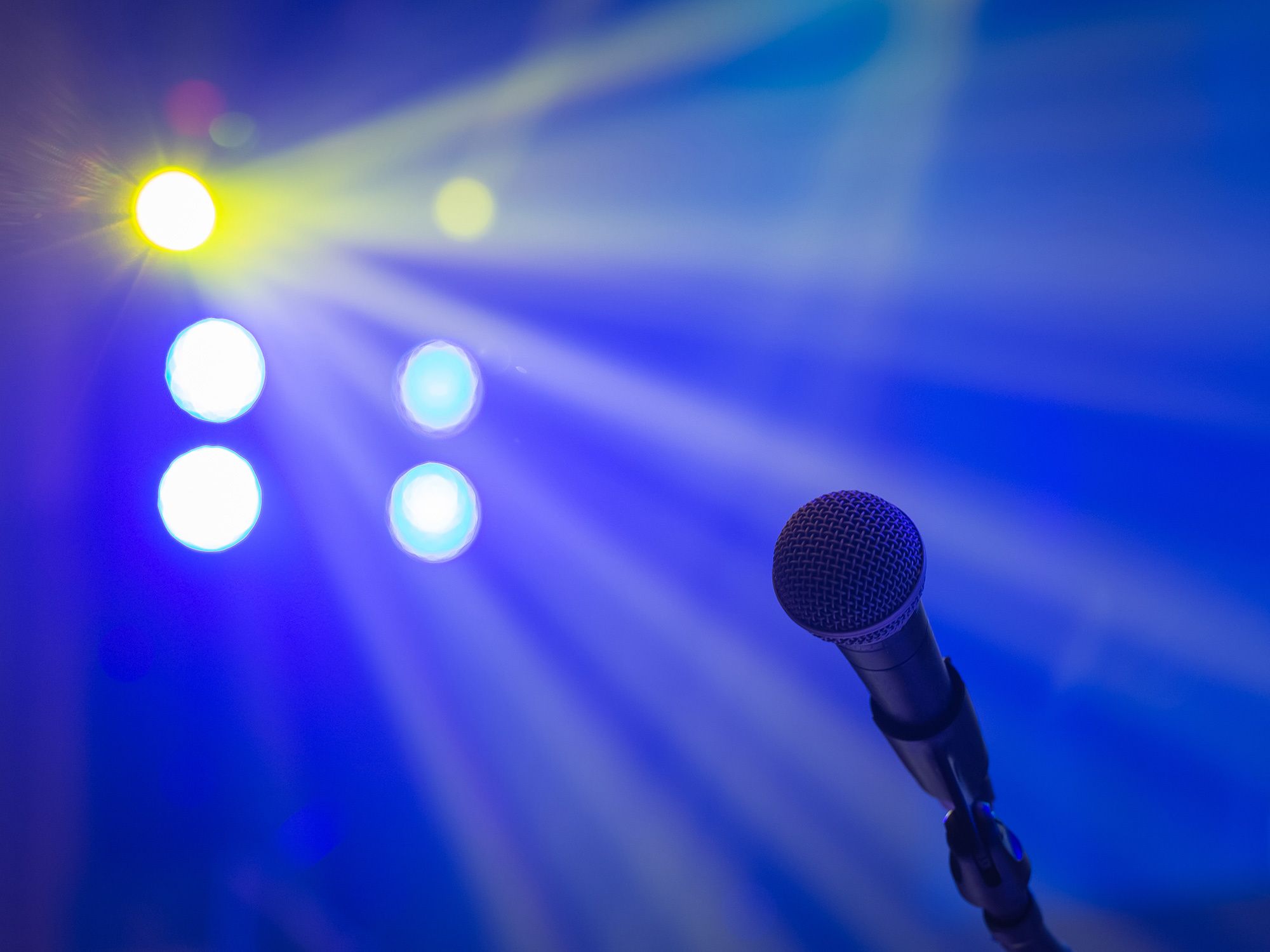 Karaoke microphone and stage lights.