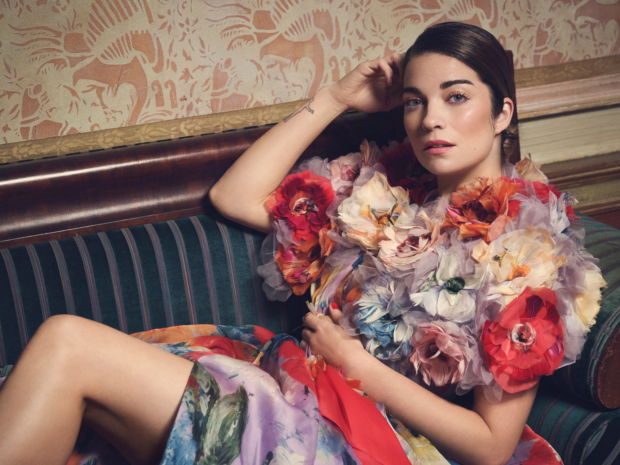 Annie Murphy in a floral embellished gown.