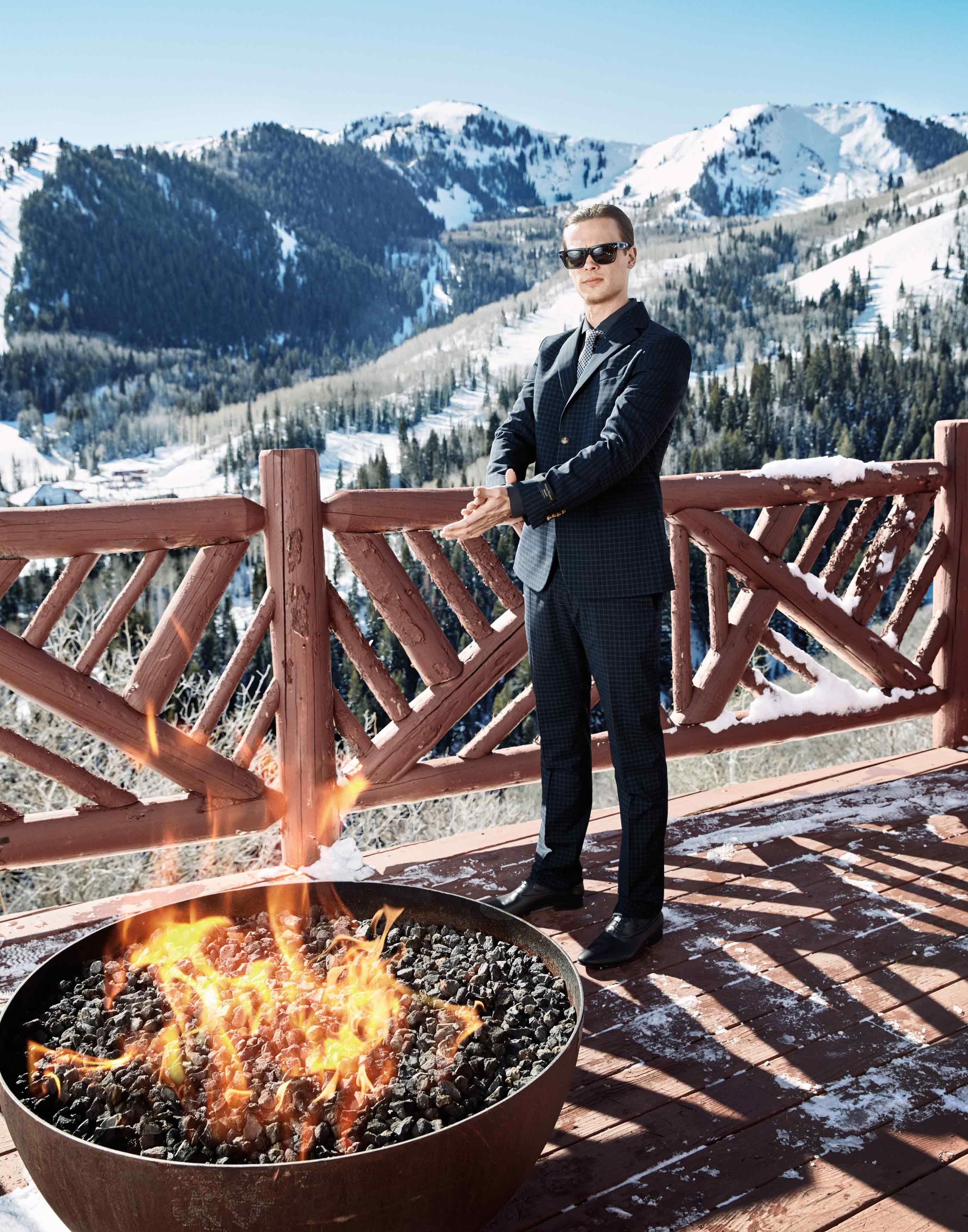 Matthew Gray Gubler outside in front of a fire pit in Utah