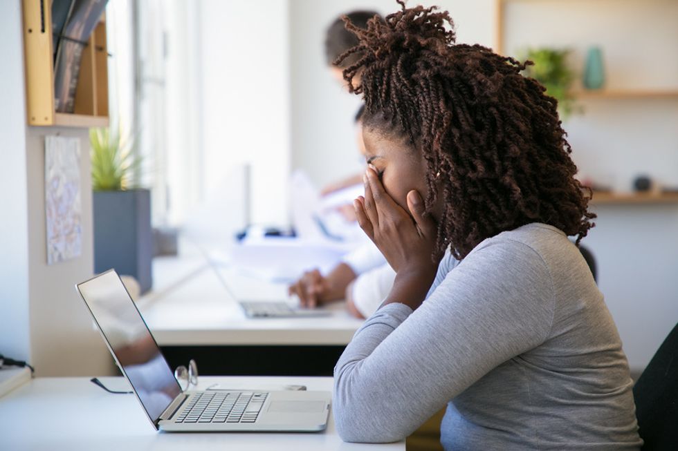 Professional woman experiences discriminatory harassment at work