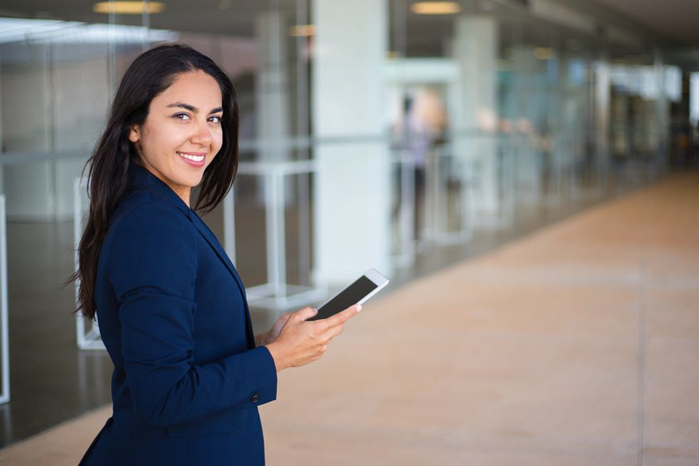 Professional woman builds positive habits for career success