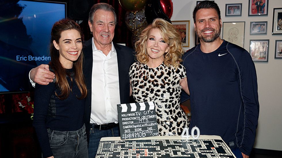 Amelia Heinie Eric Braeden Melody Thomas Scott and Joshua Morrow in front of a cake