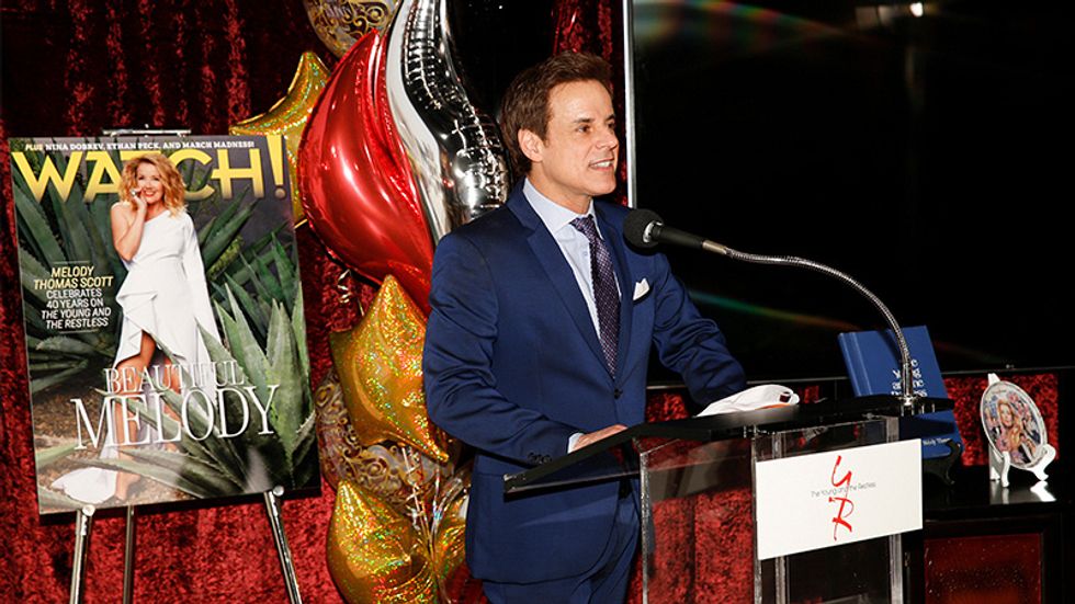 Man standing at a microphone