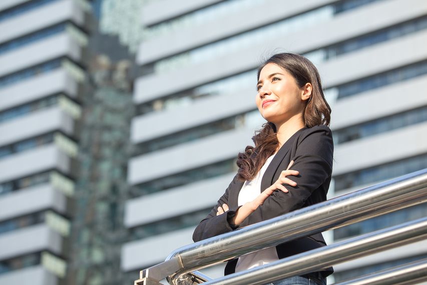 Professional woman thinking about what she wants to achieve in her career