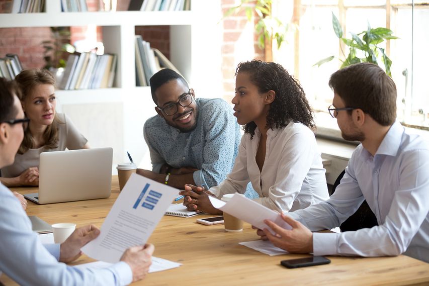 Group of loyal employees working together