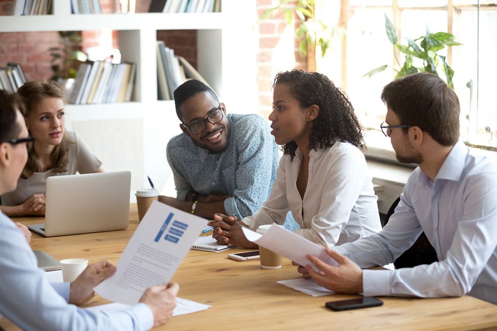 Group of loyal employees working together