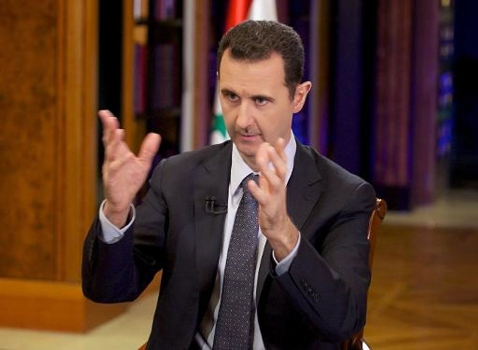 Assad Says Syria Will Comply With UN Arms Resolution
