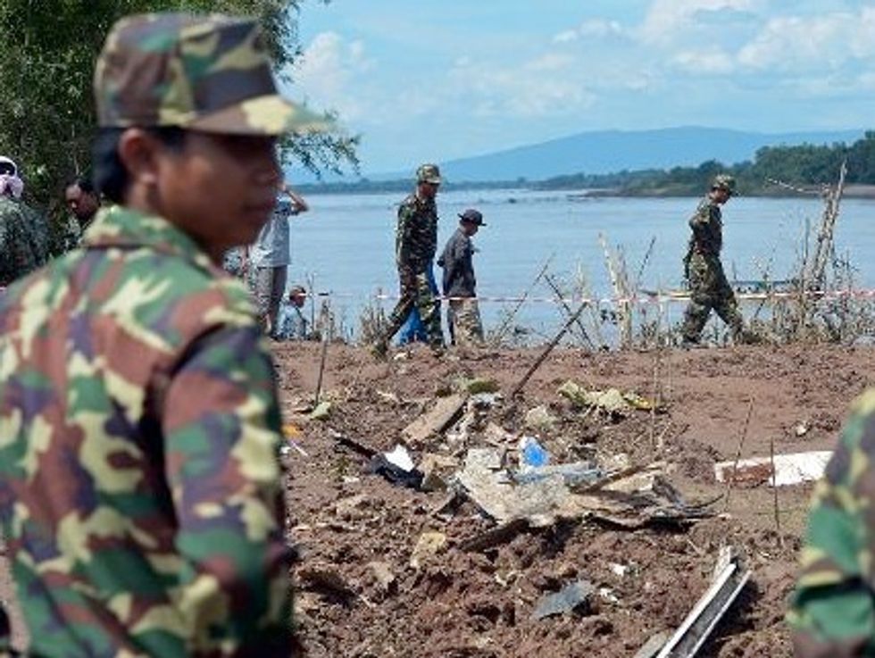 Rescuers Struggle To Find Laos Plane Crash Victims
