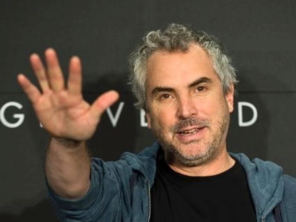 ‘Gravity’ Director Cuaron Says Oscar Talk Premature