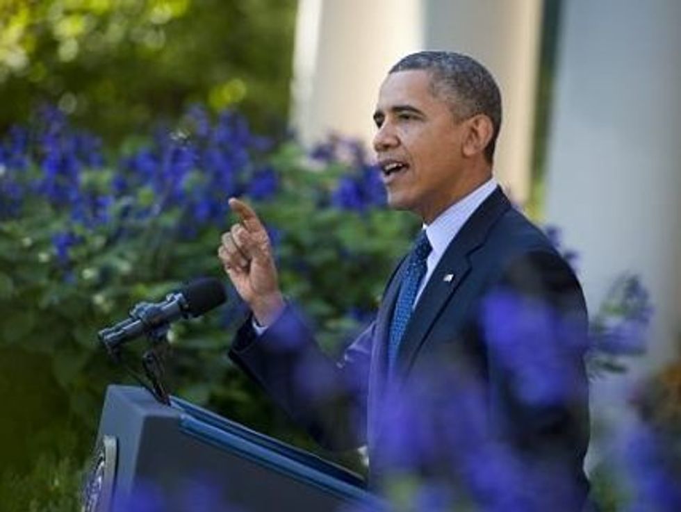 Obama Defends Health Law Despite Chaotic Debut