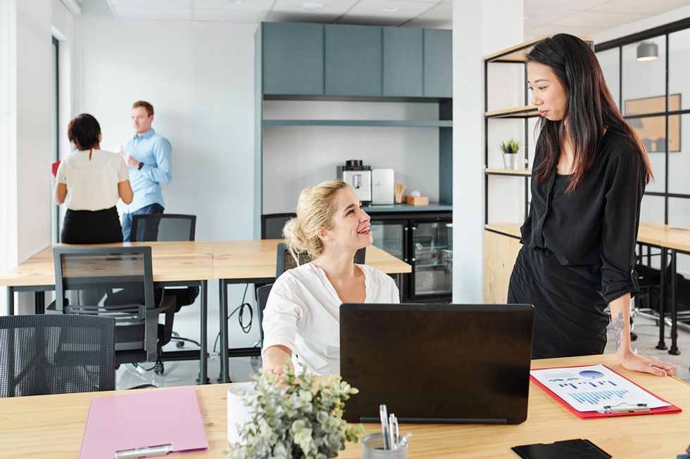 Woman gives over more control to her colleague