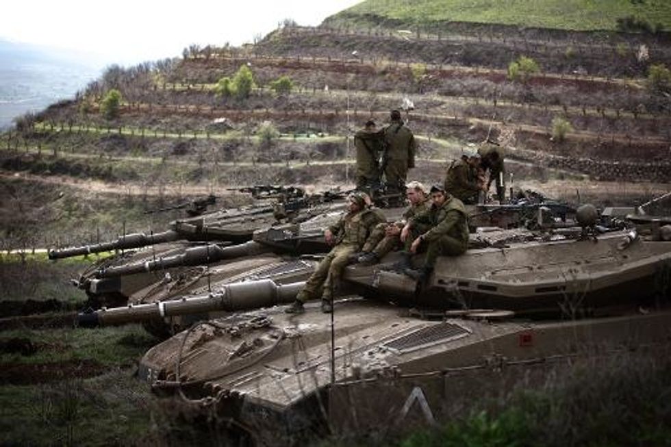Israel Attacks Syrian Bases After Four Soldiers Wounded
