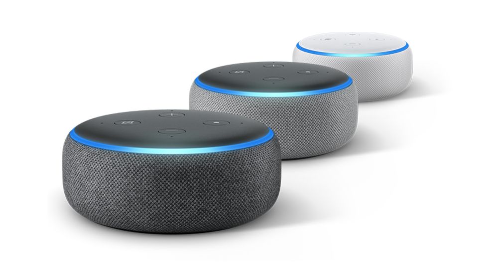 Three Amazon Echo Dots in different fabric colors
