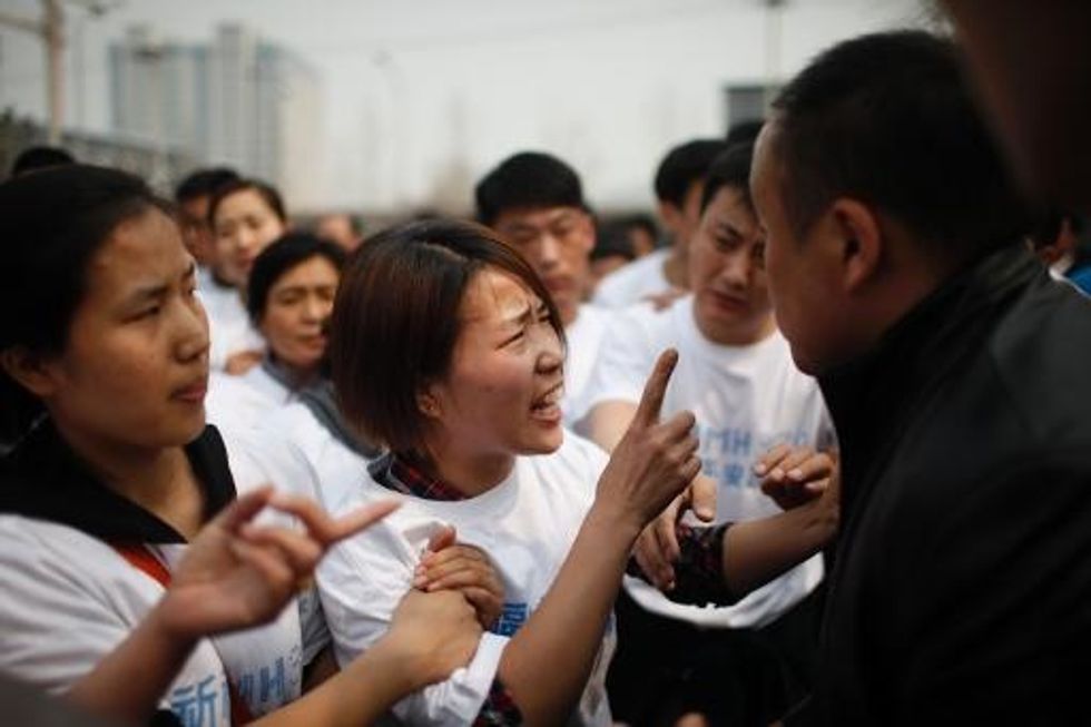 Families Of Malaysia Jet Passengers Protest In Beijing