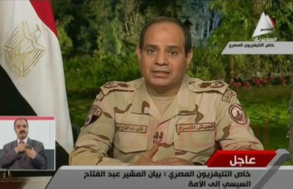 Egypt’s Sisi Ditches Uniform, Quits As Defense Minister