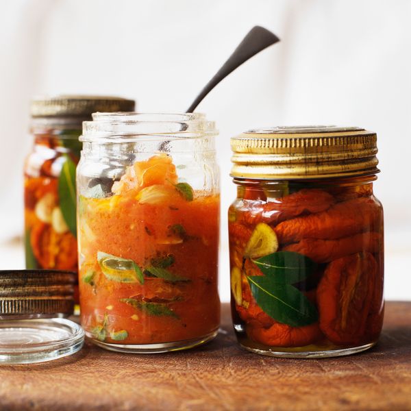 Canning jars filled with fresh veggies.