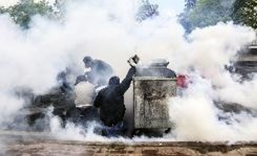 Tear Gas At Turkish May Day Protests, Red Square Rally Draws 100,000