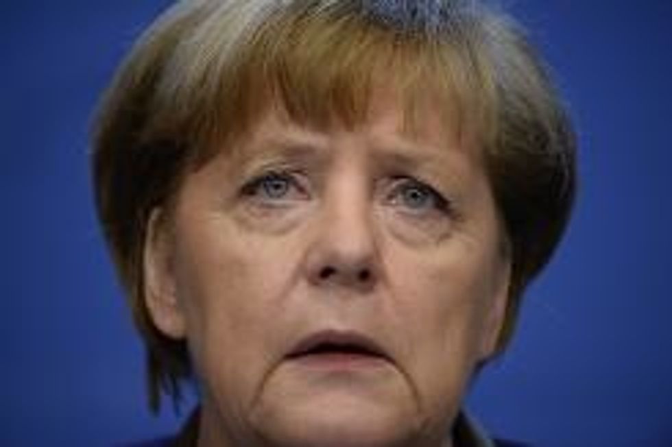 Obama, Merkel Threaten Broader Sanctions Against Russia Over Ukraine