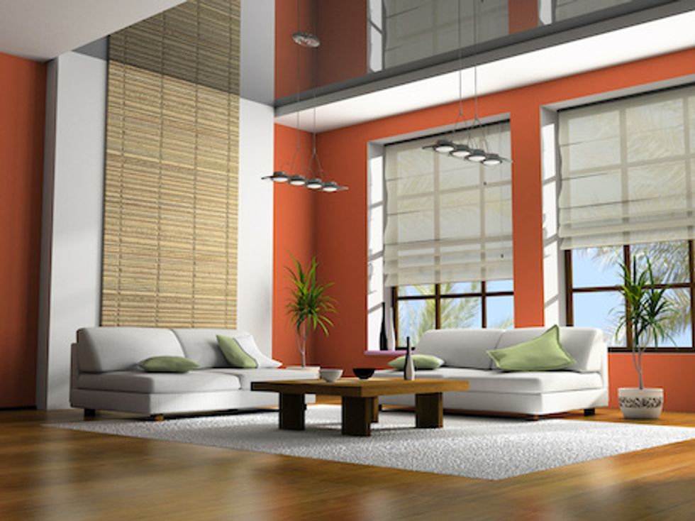 Home interior with table and sofas 3D rendering
