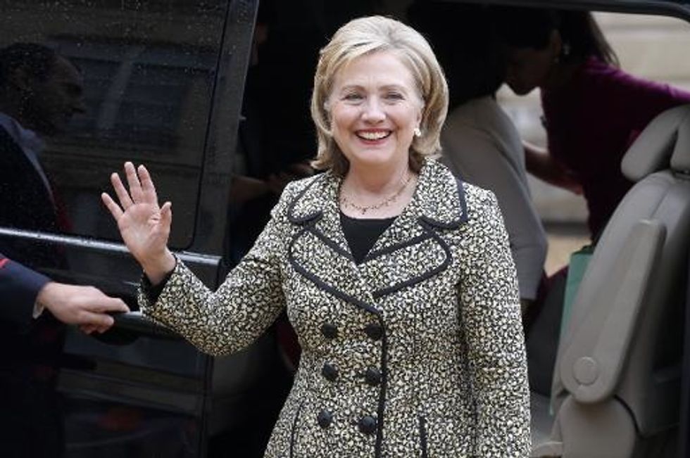 Coy Clinton Hints She’s Ready For ‘An Office Without Corners’