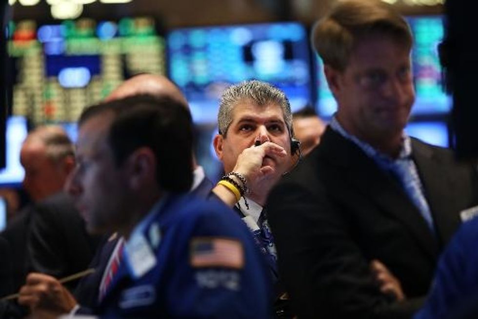 U.S. Stocks Tumble On News Of Malaysia Airlines Crash