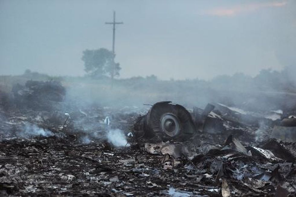 Train Carrying Malaysia Jet Victims Completes Its Halting Journey