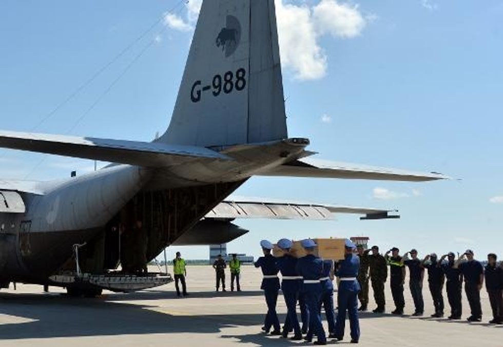 First MH17 Bodies Arrive In Bereft Netherlands