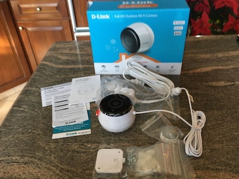 Dlink Outdoor Wi-Fi camera unboxed on a counter