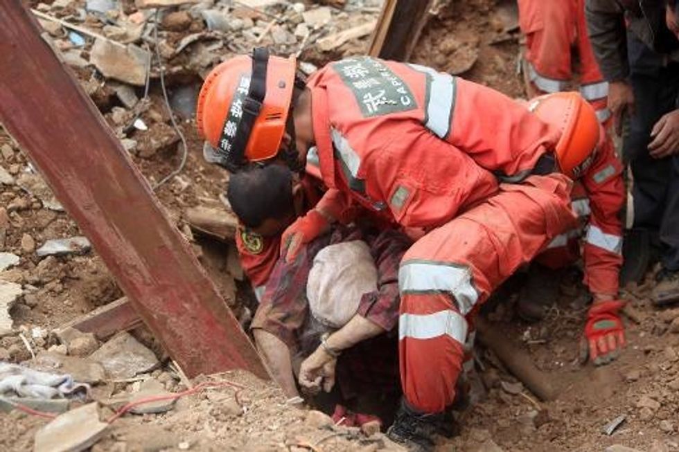 China Quake Toll Rises To 615; Muddy Noodles Open Army To Scrutiny