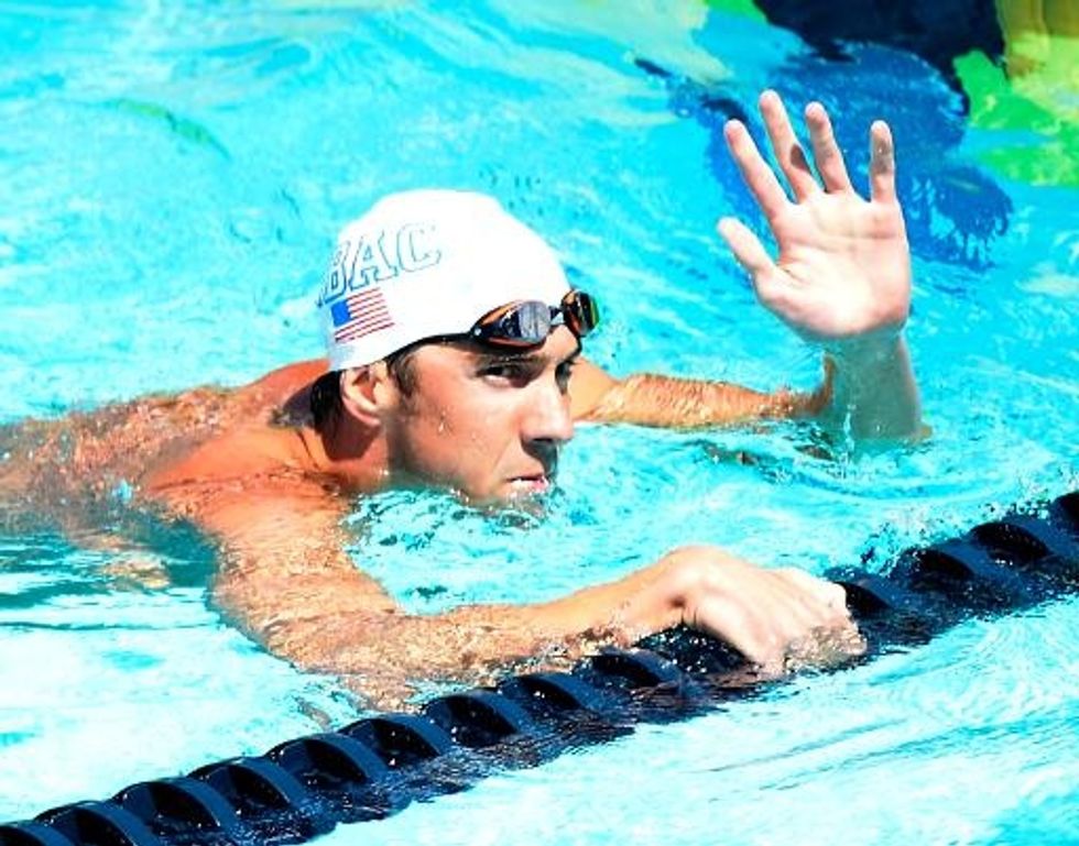 Phelps Strong In 100m Fly Qualifying