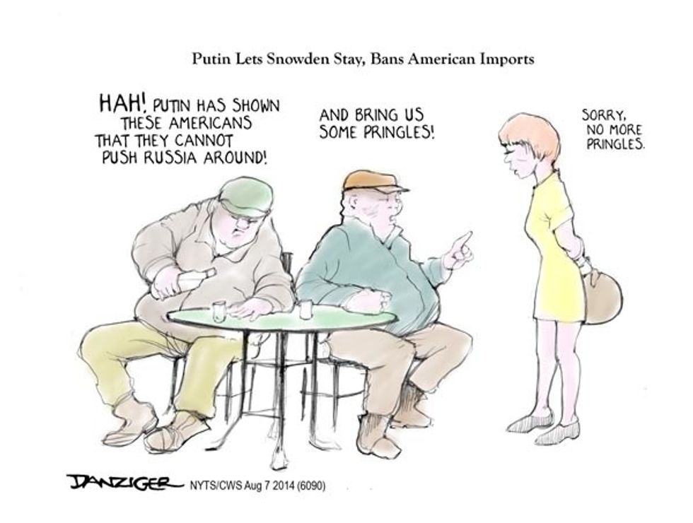 Putin Lets Snowden Stay, Bans American Imports