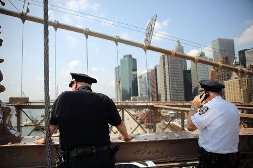 Two German Artists Claim Brooklyn Bridge Flag Stunt